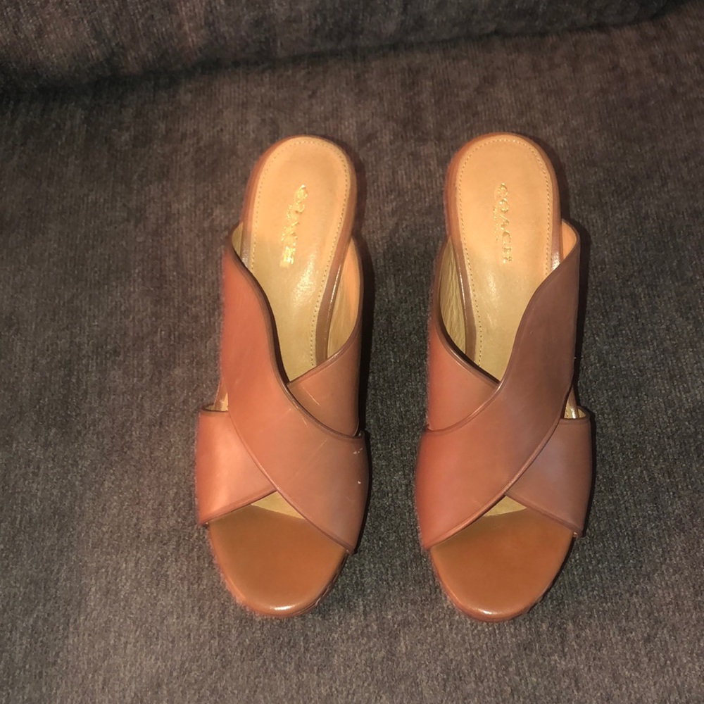 Coach leather slip in shoes.  I am a 7.5 and they fit me and are so comfortable!